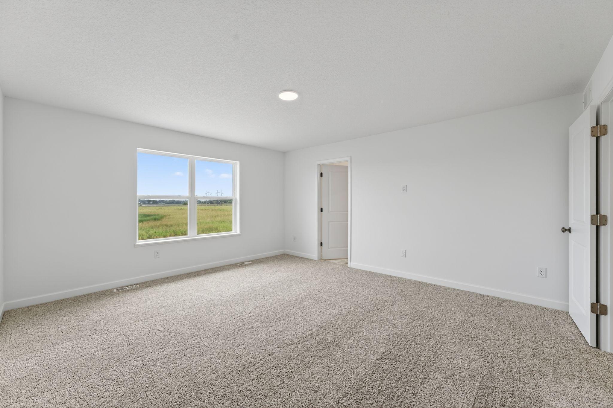 (Photo of a similar home, actual finishes may vary)