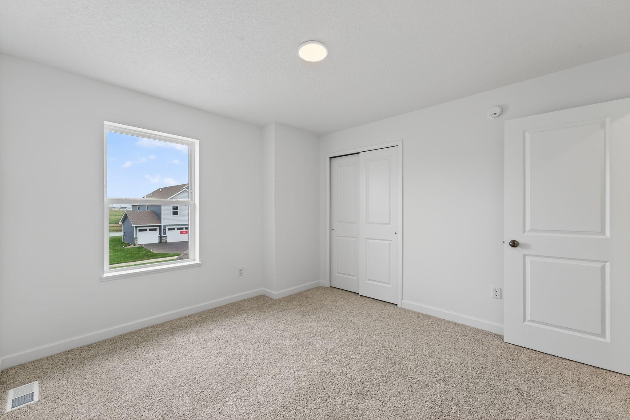 (Photo of a similar home, actual finishes may vary)