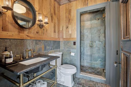 After a refreshing swim, you can head back to the bathroom, which features a luxurious steam shower designed for relaxation and rejuvenation.