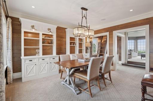 The upper-level office space is a versatile gem, featuring two interconnected rooms that flow seamlessly into one another.