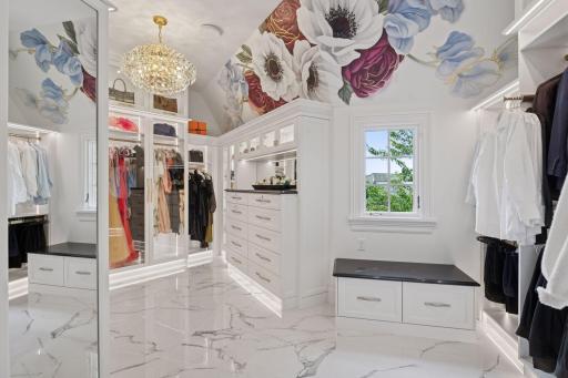The primary private closet and bathroom are a harmonious blend of luxury and seamless flow, creating an indulgent retreat.