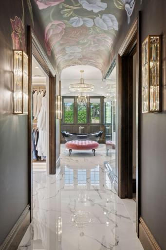 The primary master bath boasts luxurious finishes creating an atmosphere of tranquility.