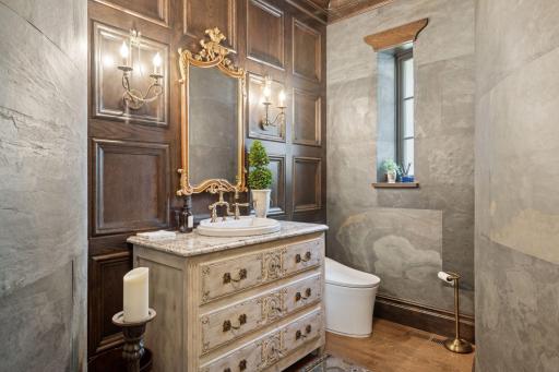 1/2 bathroom off the entry with curved slate walls. A true artistic feature.