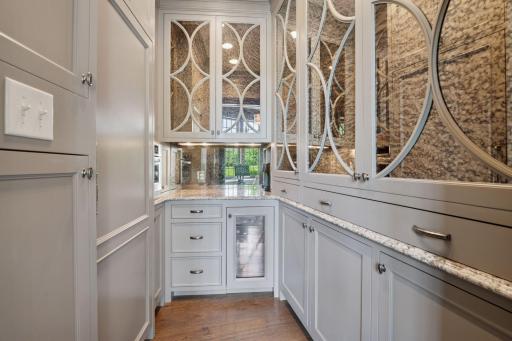 Off the kitchen is the butlers pantry’s. Elegant finishes and carefully designed organization enhance the overall flow of the space, making it an essential yet stylish hub for entertaining.