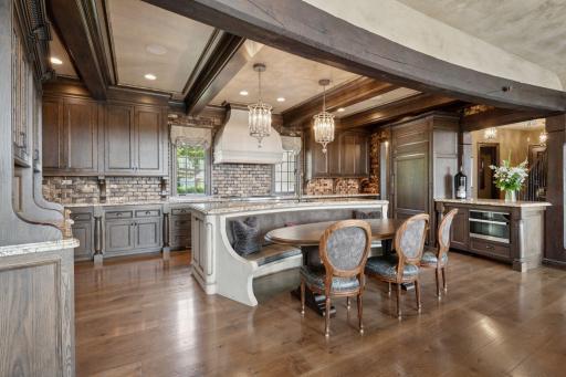 The custom features are endless! Pull outs on each side of the island, soft close drawers, 2 sinks, and under cabinet lighting.