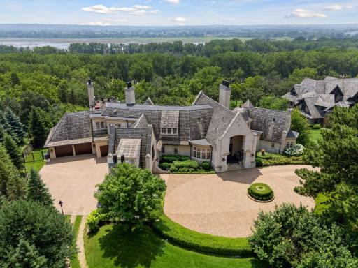 Nestled privately at the end of the exclusive "Bellerieve" neighborhood- a gated community featuring 8 exceptional luxury properties.
