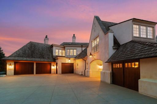 The expansive garage is a standout feature, offering ample space for vehicles, storage, and more. With generous dimensions, it comfortably accommodates multiple cars while leaving room for motorcycles or any additional recreational vehicles.