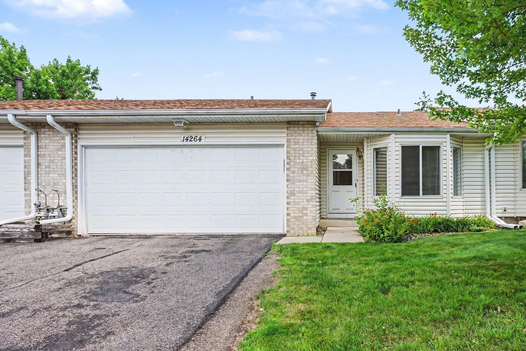 Front exterior of this one-level Apple Valley MN townhome, located on a quiet dead-end street