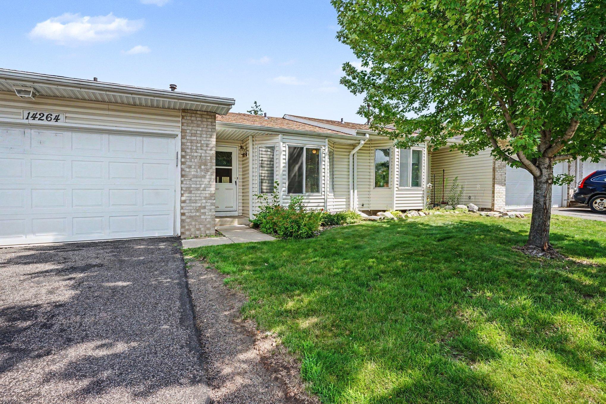 Covered front entry to the 2 bedroom, 1 bath townhome at 14264 Glencove Path, Apple Valley MN