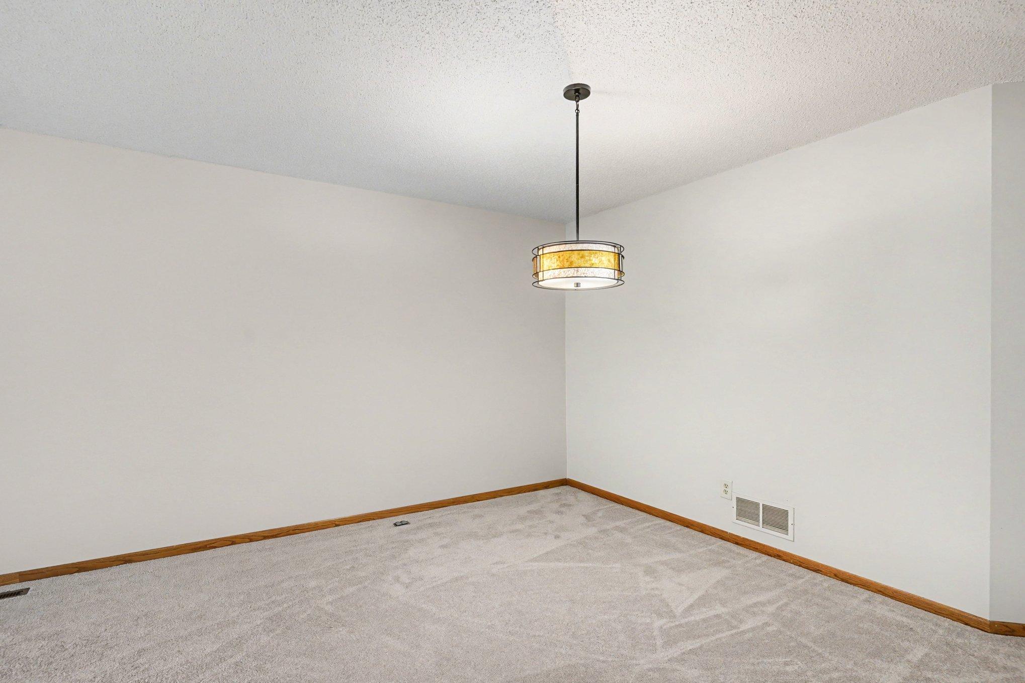 Dining area adjacent to the kitchen, part of the open one-level floor plan