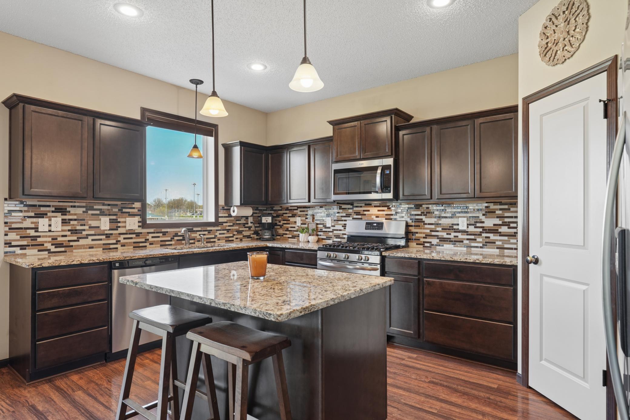 Newer gas range and microwave that vents to the outside. Electrical hook up also available if preferred.