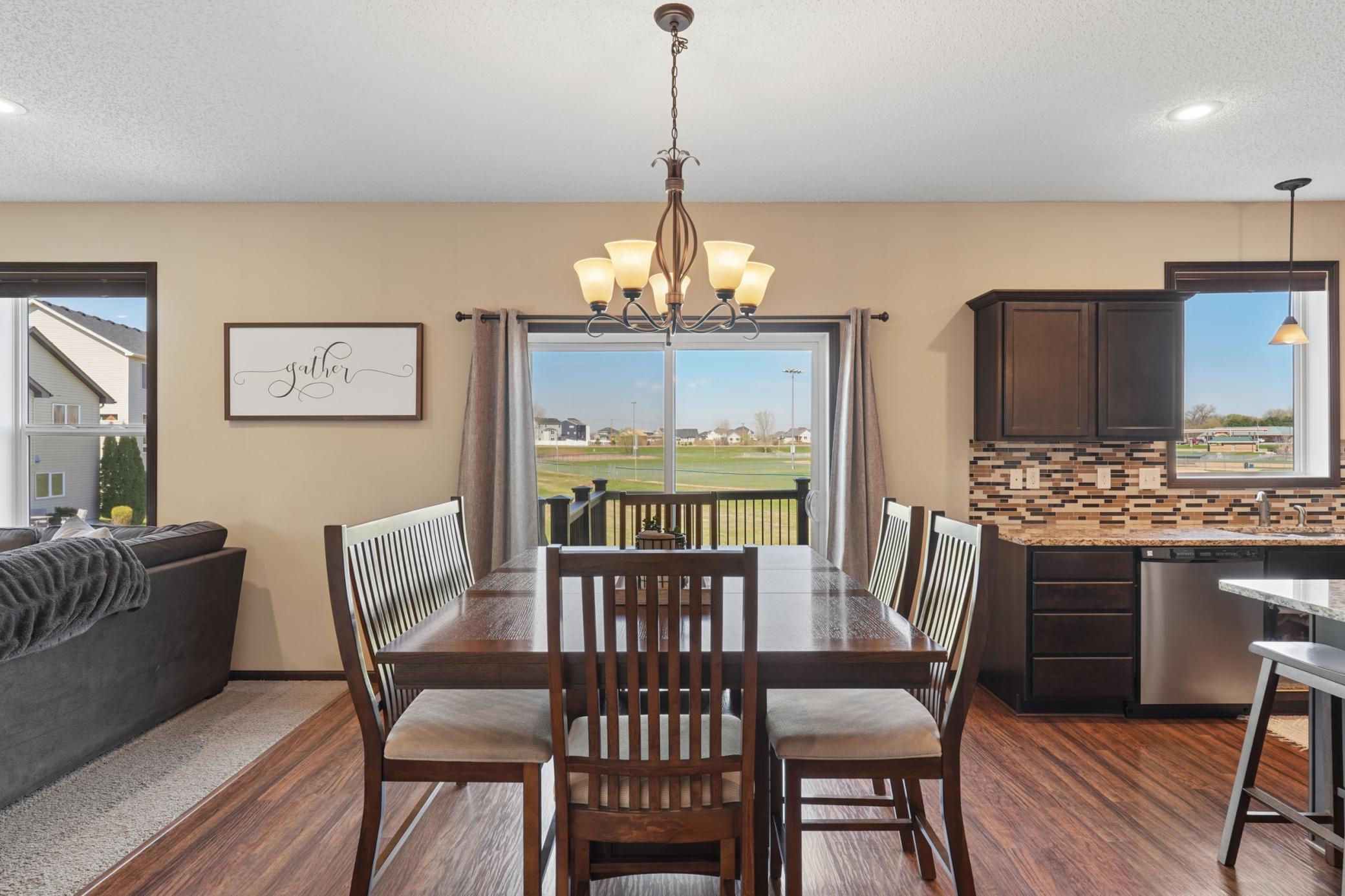 Enjoy meals and entertaining in the informal dining area and step out to the large, maintenace free deck!