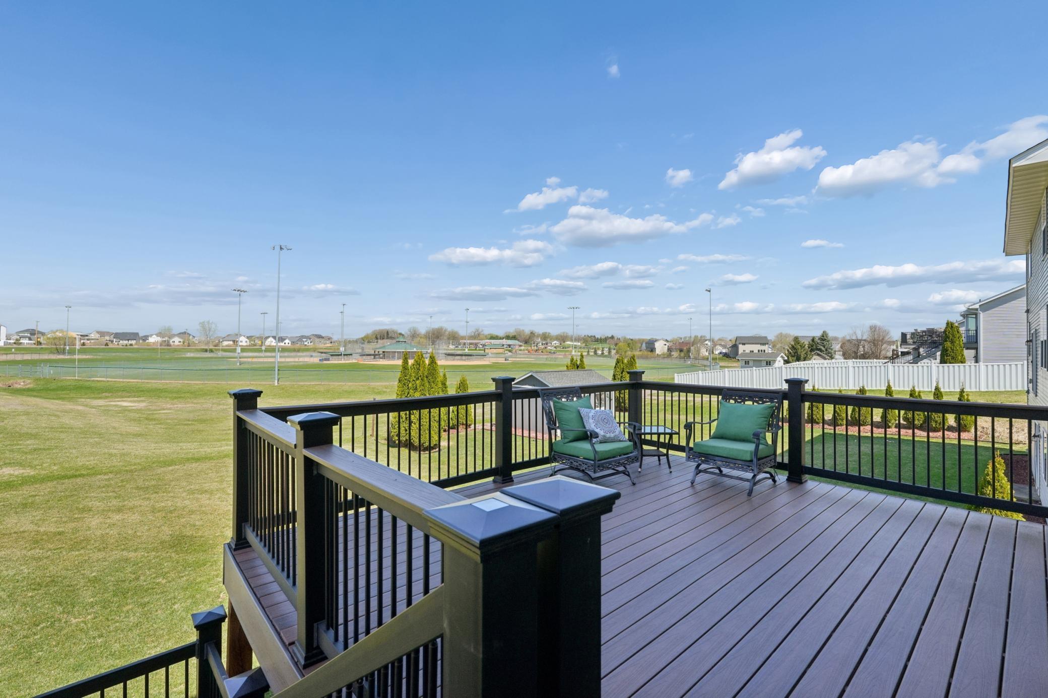 Enjoy the 16' x 14' TimberTech maintenance free deck that includes convenient stairs, making it easy to access the back yard and park. The railing and stair's solar lights provide a perfect ambiance!