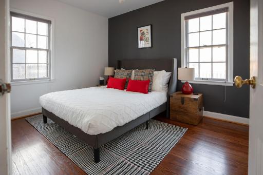 Main level bedroom with closet and garden views