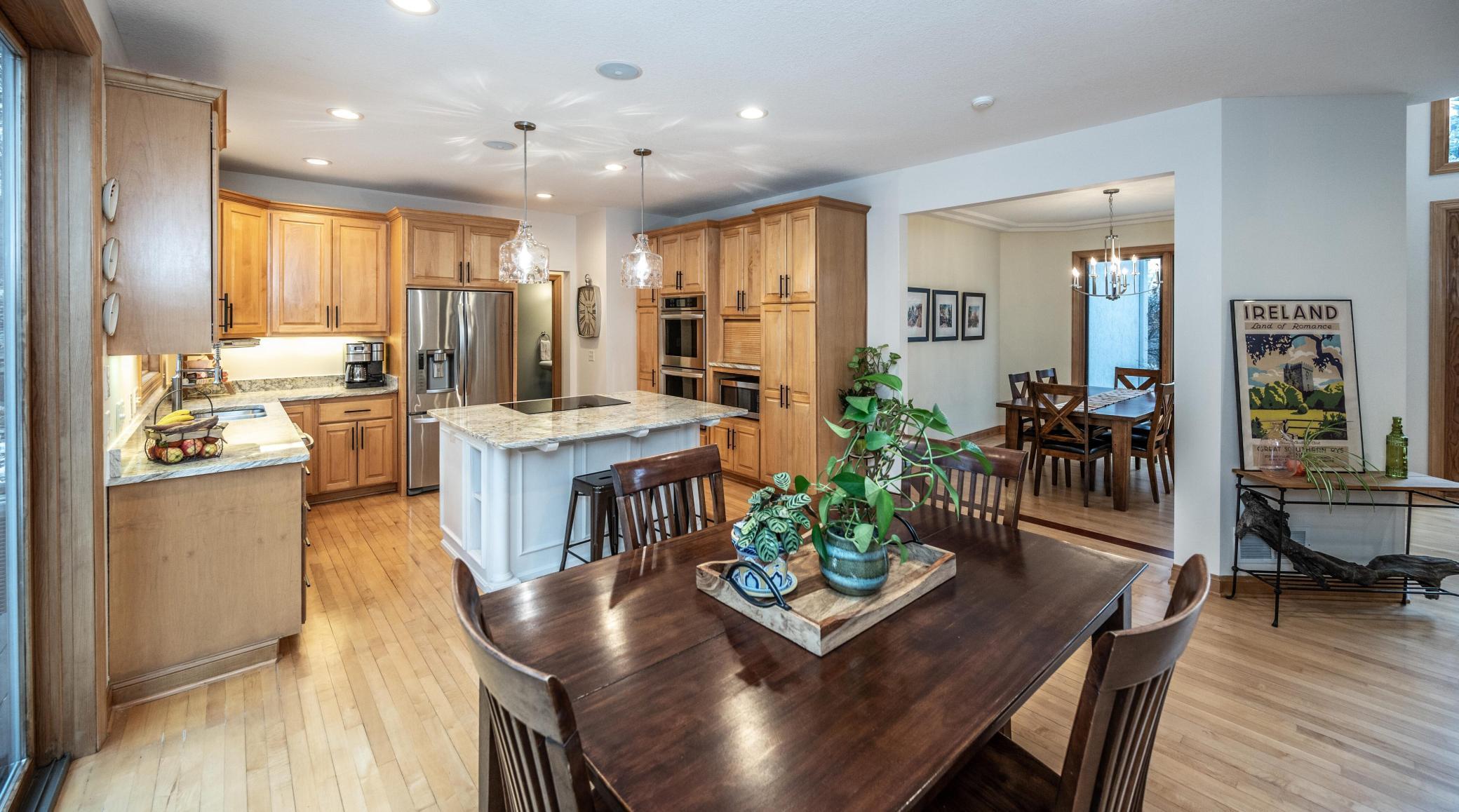 Formal dining located off the kitchen and is also open to the foyer.