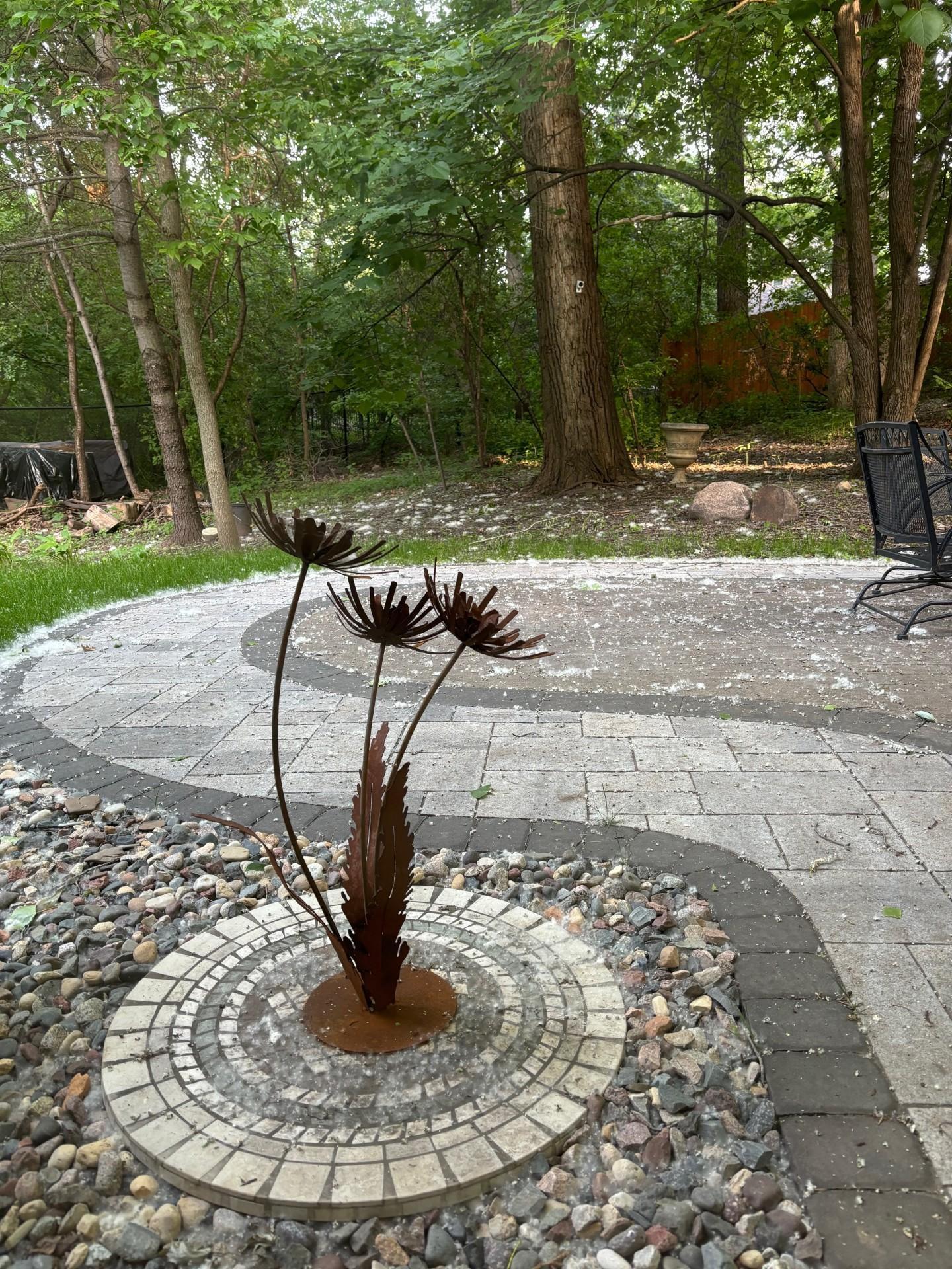 Backyard patio feature. There is also a 10x10 concrete slab located toward the back corner of the lot, easy to add a shed if one wanted.