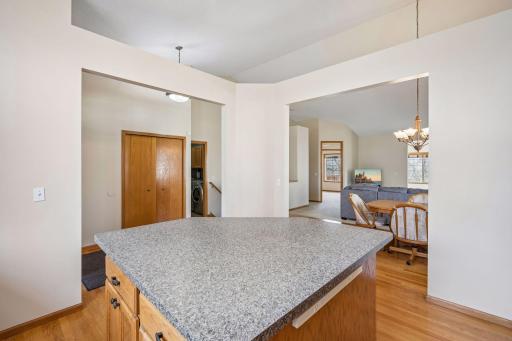 View from the Kitchen to Dining, Laundry, Bedroom and Living Room.