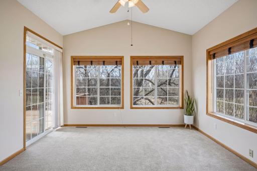 Bright Sunroom walks out to newer deck!