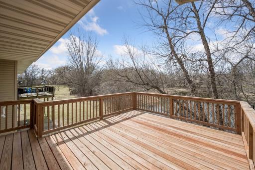 Large deck overlooking pond and wildlife.