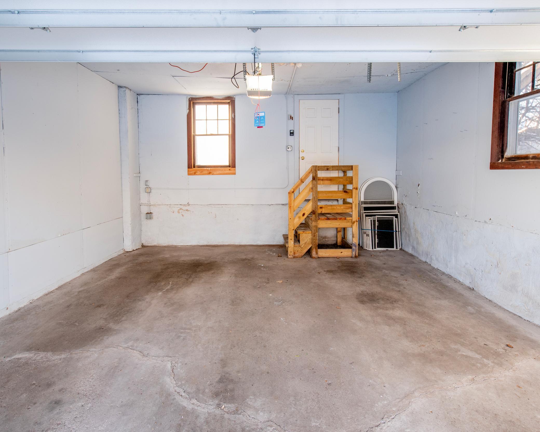 Solid two car garage with electricity to garage accommodate 110V--EV charging station if desired