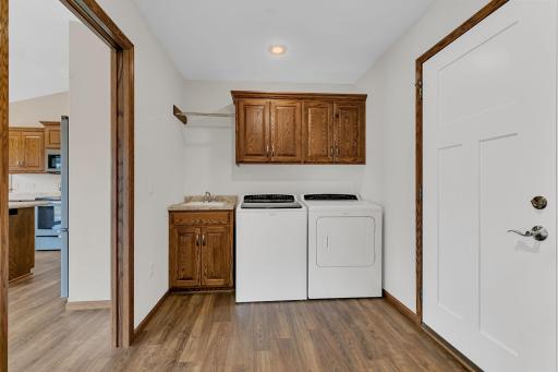 Laundry and sink with pocket door to main area
