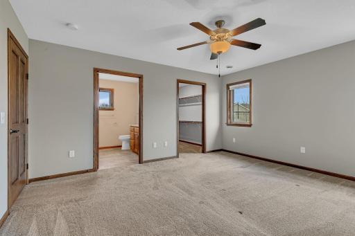 Primary Bedroom with Private 3/4 bath and walk in closet