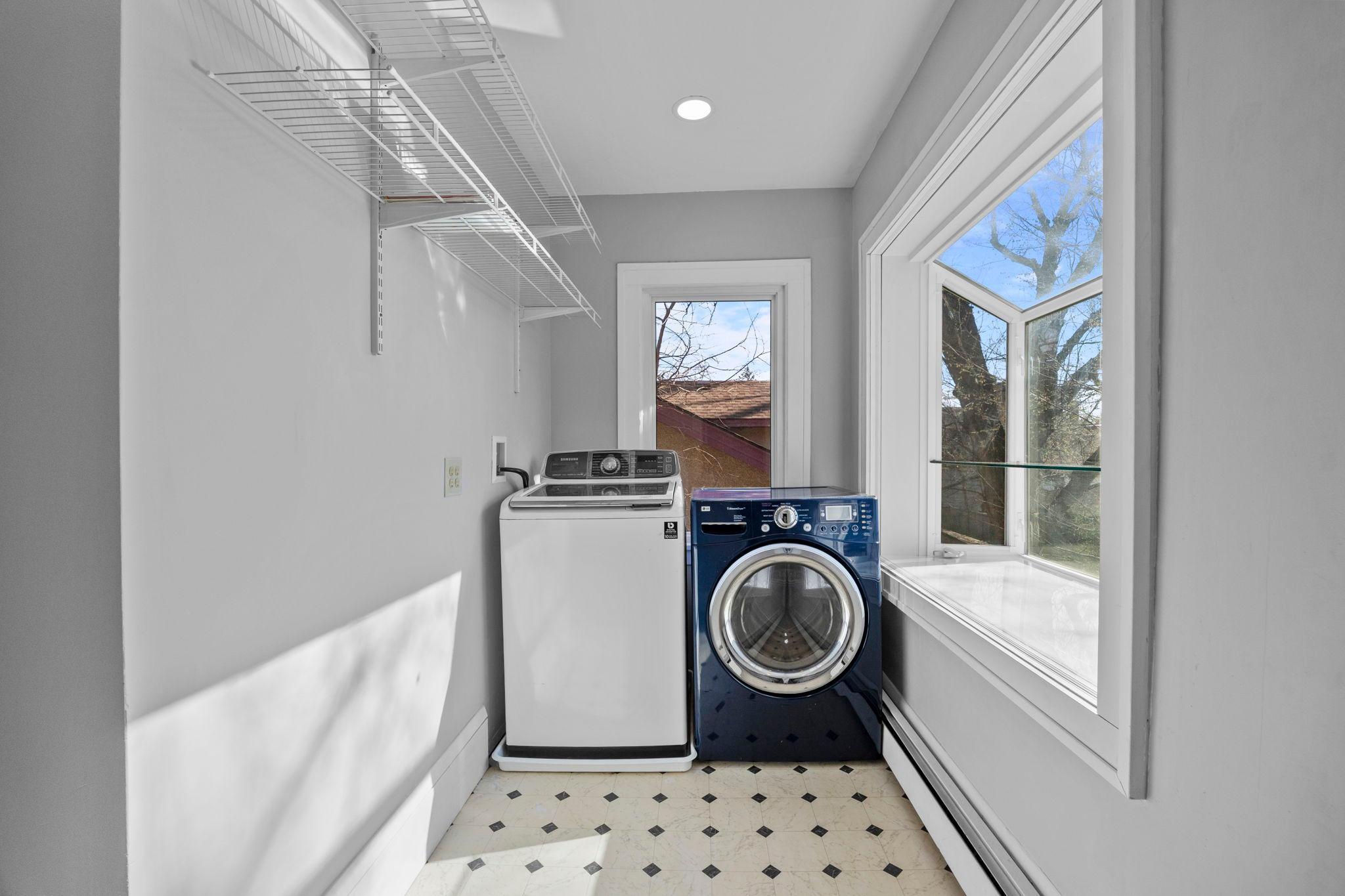 Second floor laundry with garden window