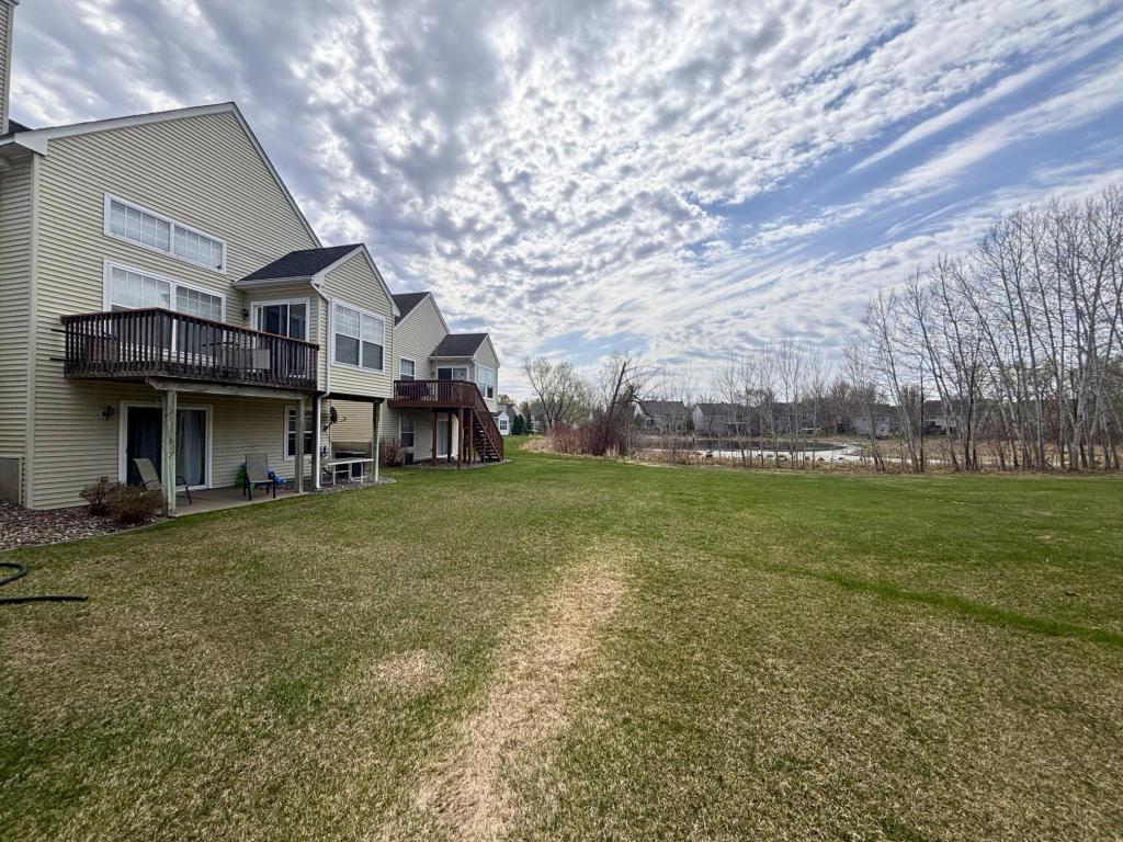 Wonderful, flat, grassy yard with a pond view!