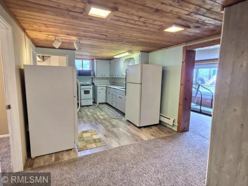 The adorable and highly functional lower level kitchen is ideal for extended guests, in-laws, etc. Appliances DO NOT stay.