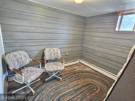 One of the 4 lower level rooms sits outside of the laundry room and offers a nice space for an office, storage, play room, etc.