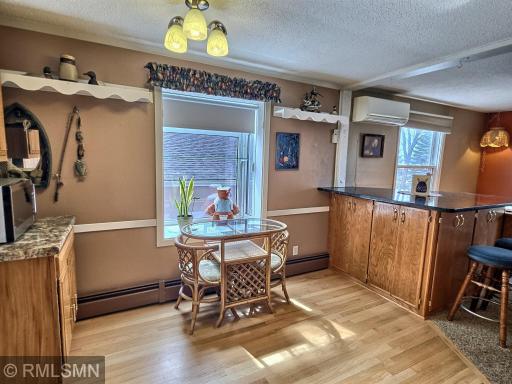 A wonderful sitting nook within the kitchen provides extra space for family or guests to relax.