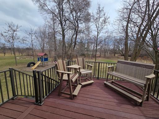 A great space to keep an eye on those at the play set while grilling.