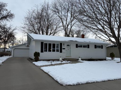 Front, seller thinks shingles are aprox 8 years on home and garage