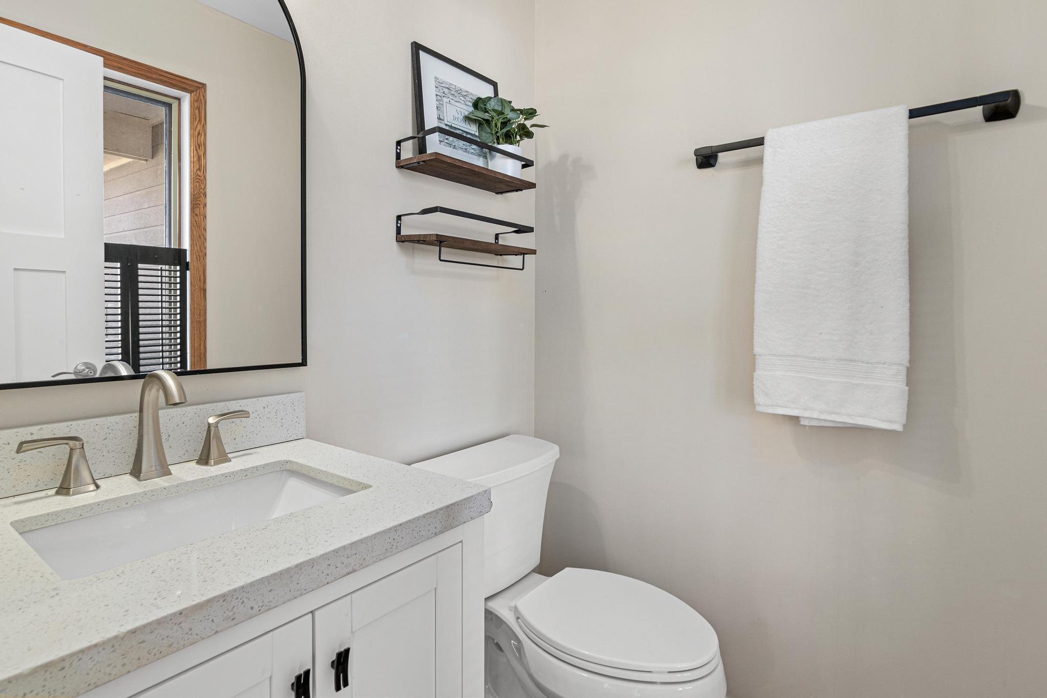 Updated main level half bathroom.