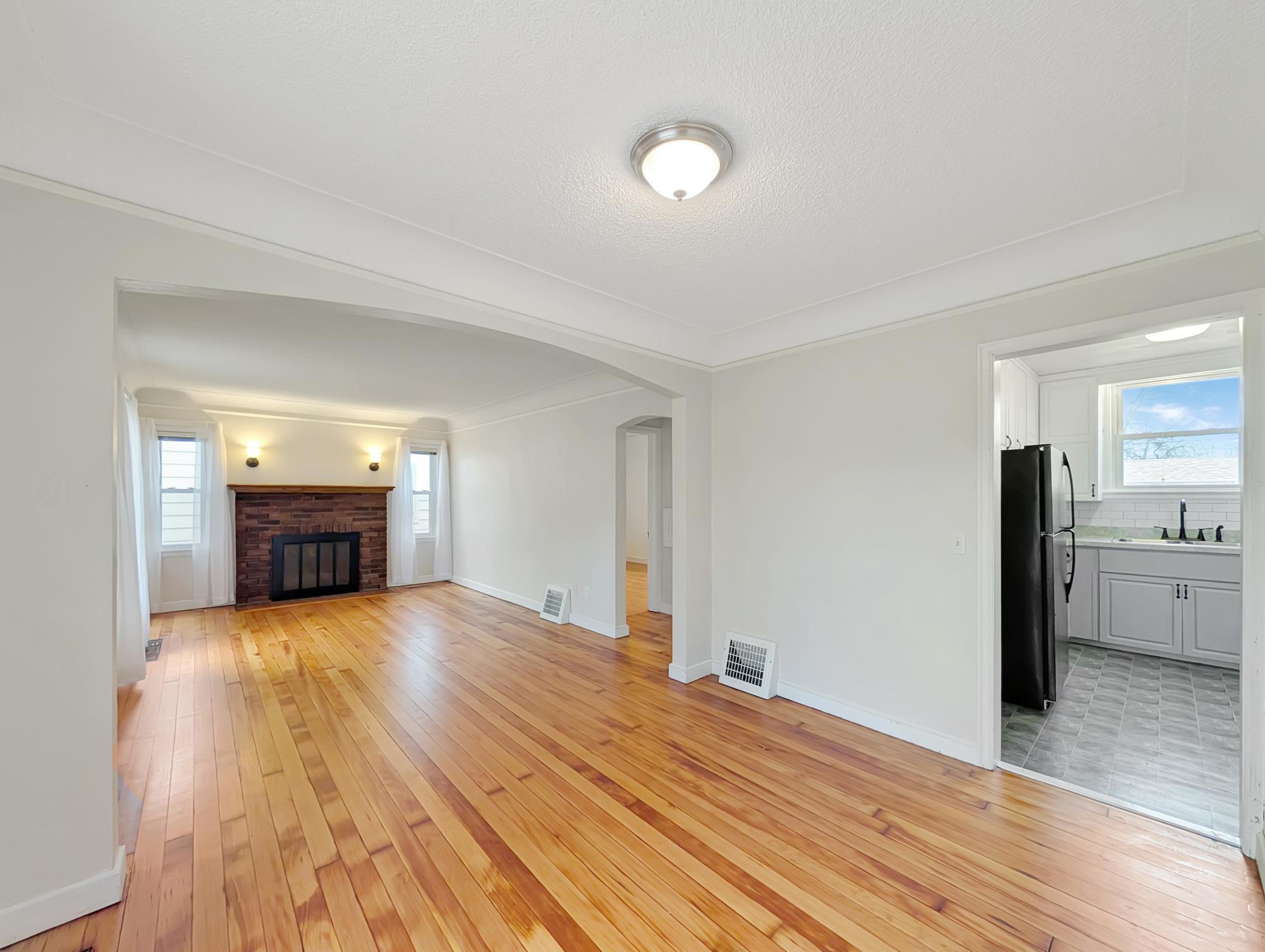 This living room features just refinished hardwood flooring!