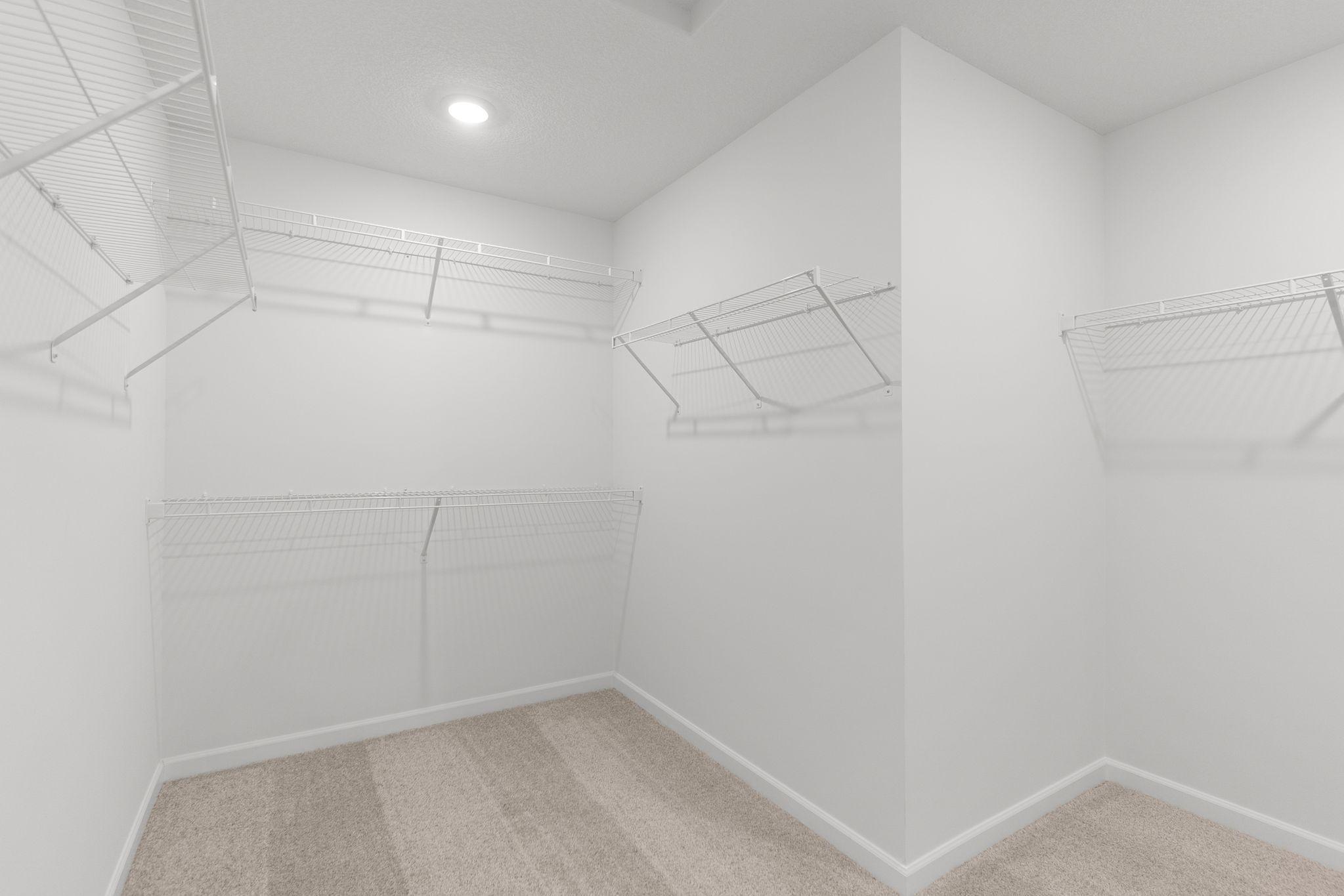 Owner's Closet (Photo of similar home - Colors and selections will vary)