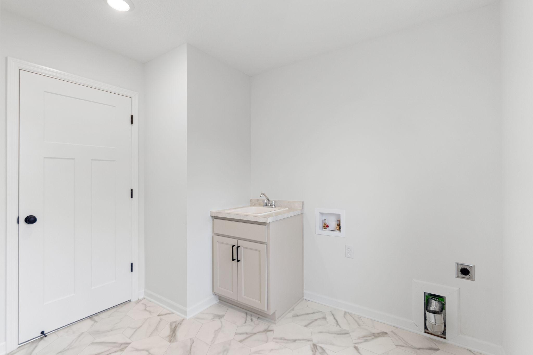Laundry Room (Photo of similar home - Colors and selections will vary)