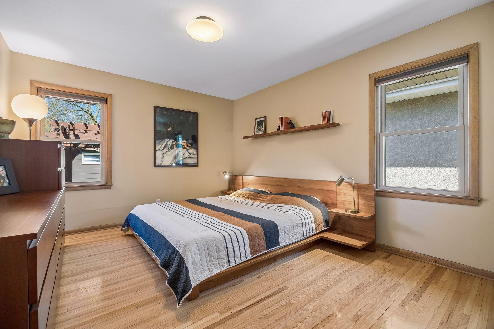 Real hardwood floors in Primary. One of 3 bedrooms on main level