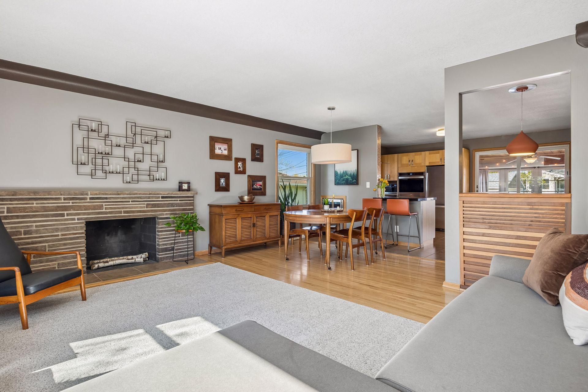 Updated! Gleaming hardwood floors, new lighting, updated kitchen..