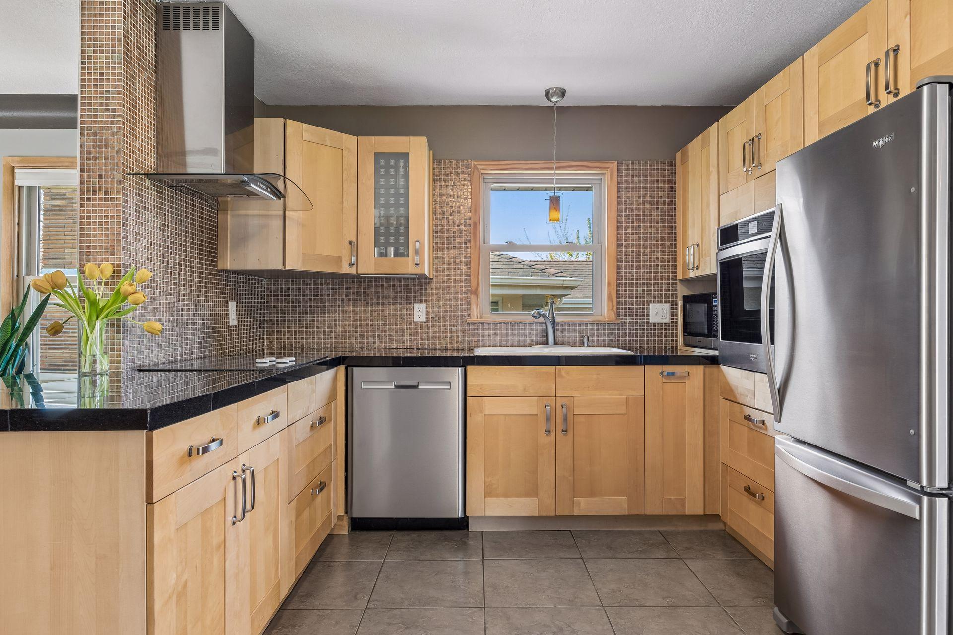 Updated kitchen with newer stainless appliances.