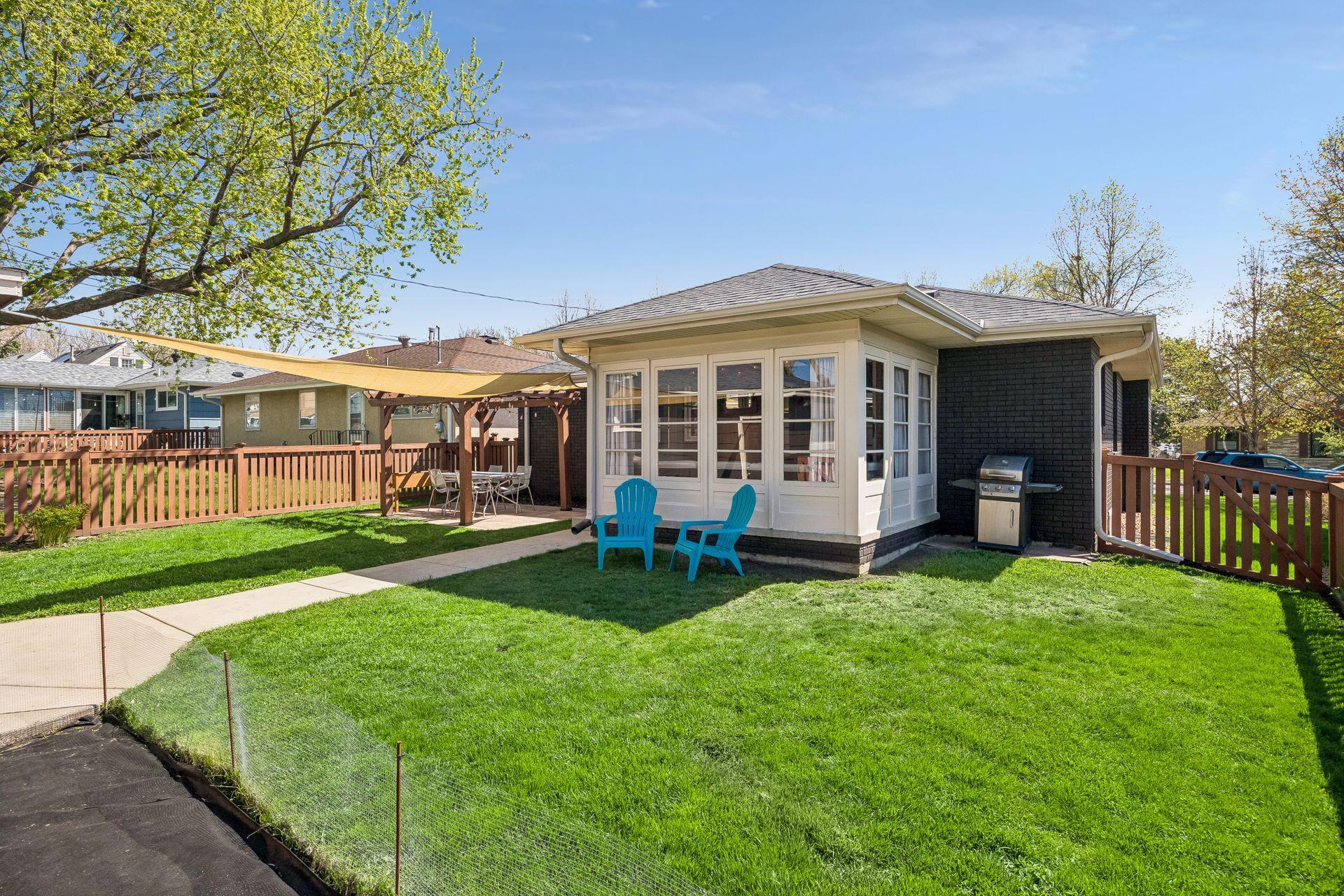 Fully fenced yard with sun shades
