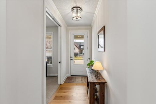 Entryway opens to brightly lit, open layout