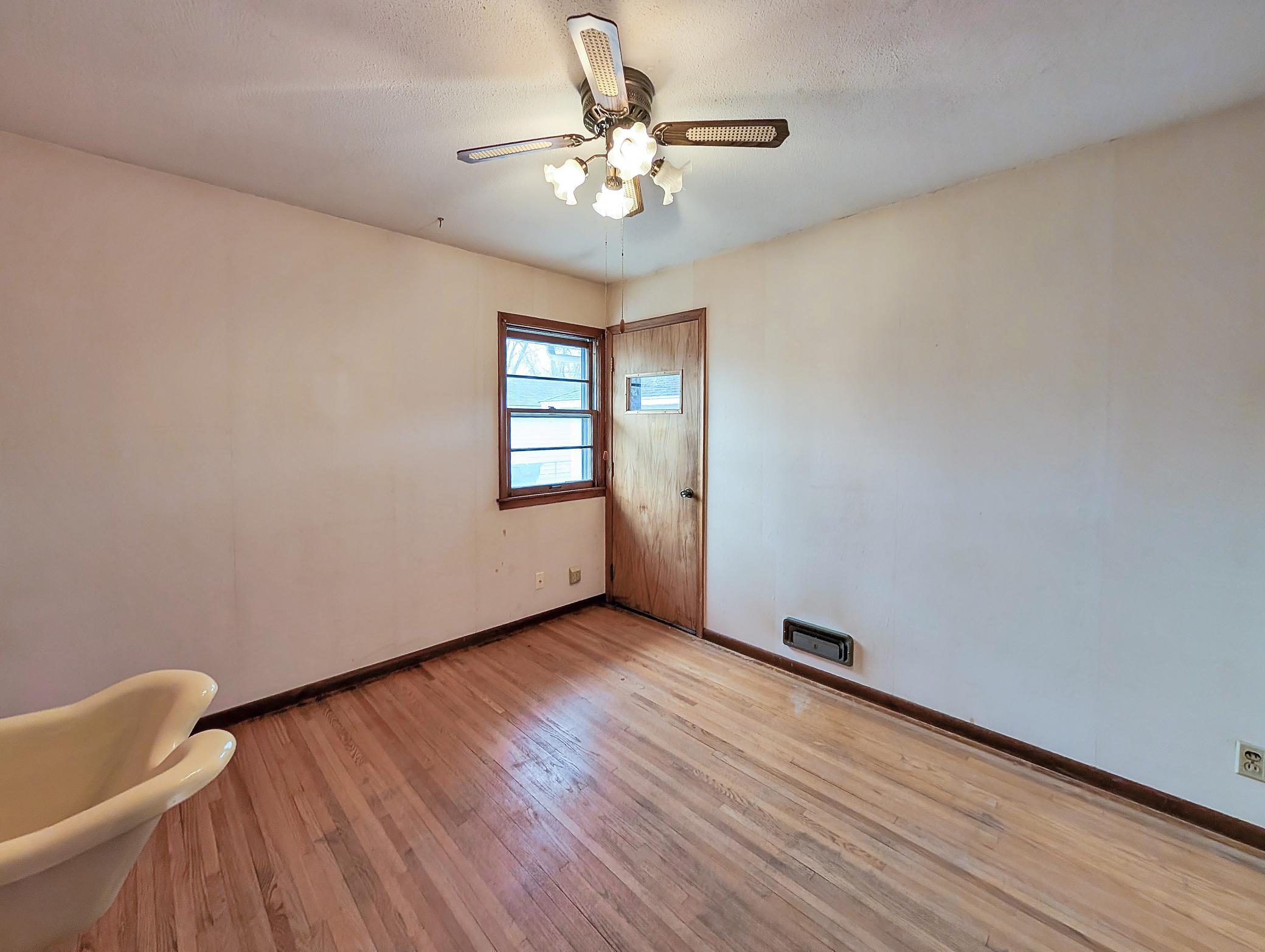 Primary bedroom with door to back yard!