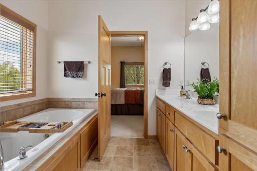 Separate shower & bath in primary bathroom