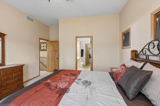 Primary bedroom leads to en suite and walk in closet