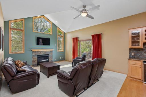 Light-filled living room with focal-point fireplace
