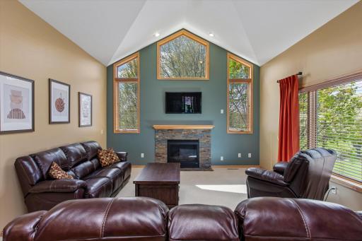 Window filled living room creates bright, welcoming feel