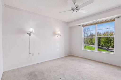 Primary bedroom with private ensuite and walk-in closet