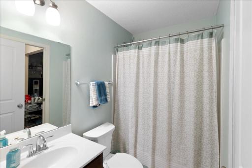 A Fresh, Light Filled Bathroom with Simple, Functional Style