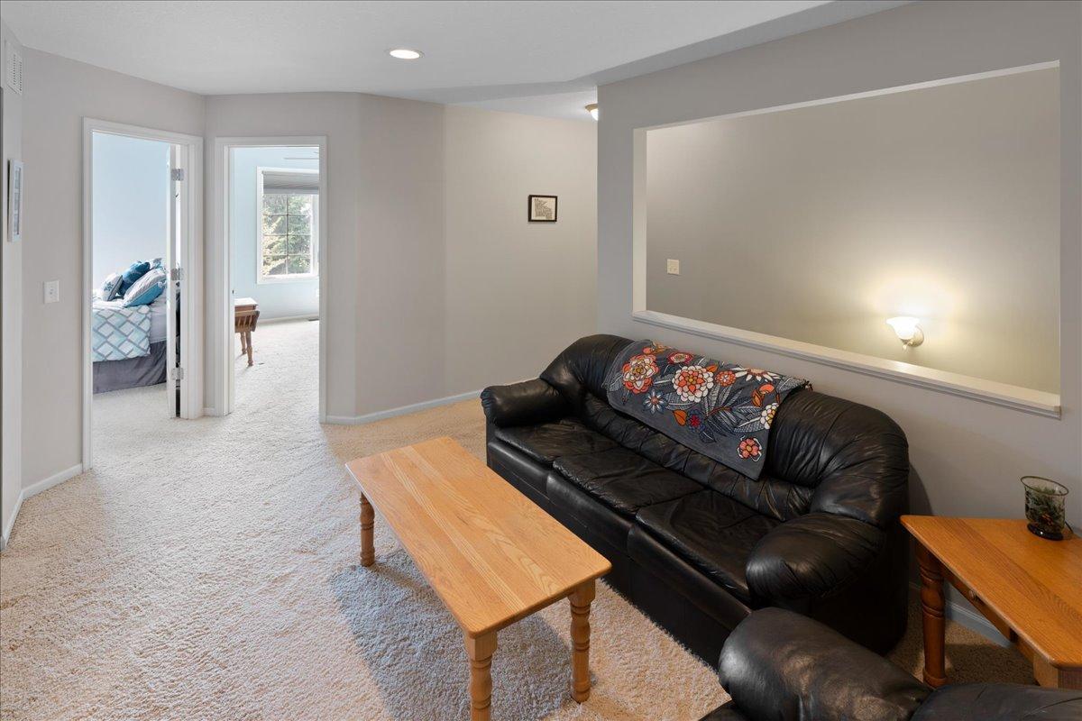 Versatile loft space: ideal for office, media, or flexible living.